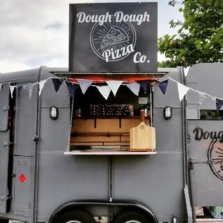 2009 Panthers - Dough Dough Pizza Co. logo